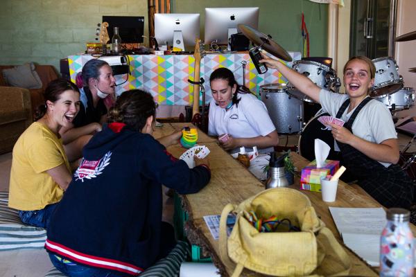 Young crew at Sanctuary Mallacoota playing cards together.
