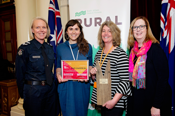 image of four people holding an award at the YACVic Rural Awards ceremony 